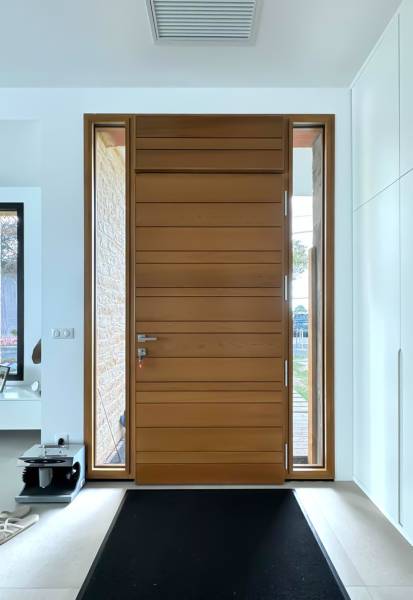 Pose et installation d'une porte d'entrée en bois Nativ à Saint-André de Cubzac